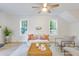 Inviting living room with a comfortable sofa, neutral tones, and plenty of natural light at 201 Driver Ave, Summerville, SC 29483