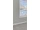 Bright bedroom featuring a large window with views of the outdoors and neighborhood at 202 Garden Gate Way, Summerville, SC 29486