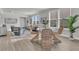 Bright dining area with modern table, chairs, and lots of natural light at 202 Garden Gate Way, Summerville, SC 29486