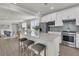 Spacious kitchen with a large island, modern appliances, and breakfast bar seating at 202 Garden Gate Way, Summerville, SC 29486