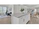 Living space with an island leading into a dining area and an adjacent sitting room at 202 Garden Gate Way, Summerville, SC 29486
