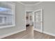 Bright office space with natural light, glass door, and wood-look flooring at 202 Garden Gate Way, Summerville, SC 29486