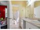 Bathroom with double sinks and tub/shower combo; view into bedroom at 213 Travelers Rest Blvd, Summerville, SC 29485
