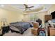 Bedroom with tray ceilings, carpet flooring, and natural light through the windows at 213 Travelers Rest Blvd, Summerville, SC 29485