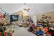 Bedroom featuring an unusual sloped ceiling, ceiling fan, and ample storage at 213 Travelers Rest Blvd, Summerville, SC 29485