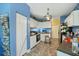 Functional kitchen features white cabinetry, modern appliances and tile flooring at 213 Travelers Rest Blvd, Summerville, SC 29485