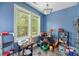 A bright office space with dual windows, ample storage space, and tile flooring at 213 Travelers Rest Blvd, Summerville, SC 29485