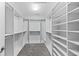Walk-in closet featuring custom shelving to organize all your clothes at 215 Overcup Loop, Summerville, SC 29486