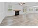 Spacious living room featuring a fireplace, and neutral flooring at 215 Overcup Loop, Summerville, SC 29486