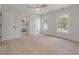 Bright bedroom with neutral tones, wood flooring, a ceiling fan, and ensuite bathroom at 2226 Red Fern Lane, Mount Pleasant, SC 29466