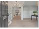 Inviting entryway with a view of the fireplace, hardwood floors, and an open floor plan at 2226 Red Fern Lane, Mount Pleasant, SC 29466