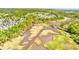 An aerial view of a neighborhood surrounded by waterways and green space at 2519 Rutherford Way, Charleston, SC 29414