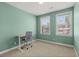 Bedroom featuring a desk, chair, and two windows offering natural light at 2519 Rutherford Way, Charleston, SC 29414