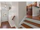 Bright entryway with hardwood floors and staircase leading to the main living area at 2519 Rutherford Way, Charleston, SC 29414