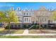 Charming townhome exterior with brick accents, landscaped yard, and a sidewalk leading to the front entrance at 2519 Rutherford Way, Charleston, SC 29414