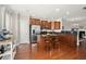 Spacious kitchen with stainless steel appliances, granite countertops, and center island seating at 2519 Rutherford Way, Charleston, SC 29414