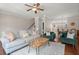 Comfortable living room with hardwood floors, stylish furnishings, and easy access to the dining area at 2519 Rutherford Way, Charleston, SC 29414