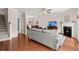 Open concept living area with hardwood floors connecting to the dining area and offering a comfortable space at 2519 Rutherford Way, Charleston, SC 29414