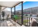 Charming porch with outdoor seating, overlooking a scenic view of the neighborhood at 2519 Rutherford Way, Charleston, SC 29414