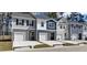 New townhomes with attached garages and varied color schemes offer modern living at 2602 Scarlett Maple St, Summerville, SC 29486