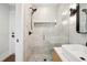 Sleek bathroom showcasing a glass shower, modern fixtures, and tiled walls at 3 Lauden Blvd, Isle of Palms, SC 29451