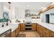 Modern kitchen featuring custom cabinets, stainless steel appliances, and quartz countertops at 3 Lauden Blvd, Isle of Palms, SC 29451