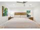 Spacious main bedroom features neutral colors, bedside tables with lamps, and large windows at 3 Lauden Blvd, Isle of Palms, SC 29451