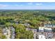 Expansive aerial view of the property, surrounded by lush greenery and showcasing its location within a vibrant community at 3010 Emma Ln, Mount Pleasant, SC 29466