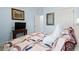 Relaxing bedroom featuring light blue walls and a cozy quilt at 3010 Emma Ln, Mount Pleasant, SC 29466