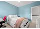 Comfortable bedroom features an accent wall, ceiling fan, and a window with natural light at 3010 Emma Ln, Mount Pleasant, SC 29466