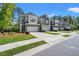 Well maintained townhomes with private driveways, two-car garages, green lawns and manicured landscaping at 3010 Emma Ln, Mount Pleasant, SC 29466