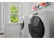 Bright laundry room with modern washer and dryer, plus storage at 3010 Emma Ln, Mount Pleasant, SC 29466