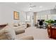 Inviting living room with a desk, sofa, and lots of natural light at 3010 Emma Ln, Mount Pleasant, SC 29466