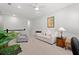 Cozy living room features neutral tones, plush seating, and natural light at 3010 Emma Ln, Mount Pleasant, SC 29466