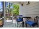 Cozy screened porch with seating, a table, and a view of the outdoors at 3010 Emma Ln, Mount Pleasant, SC 29466