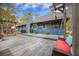Large backyard deck with cozy seating, a grill, and access to the house, creating an ideal outdoor living space at 306 Teakwood Dr, Walterboro, SC 29488