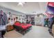 Spacious bedroom with unique decor, ceiling fan, and natural light, offering a personalized and comfortable living space at 306 Teakwood Dr, Walterboro, SC 29488