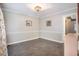 An empty dining room that is ready for you to furnish at 306 Teakwood Dr, Walterboro, SC 29488
