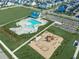 Aerial view of community pool and playground, close to neighborhood homes and community parking at 3466 Yarmouth Dr, Mount Pleasant, SC 29466