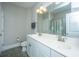 Bright bathroom featuring double sink vanity with brushed nickel faucets and a large mirror at 3466 Yarmouth Dr, Mount Pleasant, SC 29466