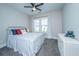 Cozy bedroom with ceiling fan, a bed with a white metal frame, and a gray carpet at 3466 Yarmouth Dr, Mount Pleasant, SC 29466