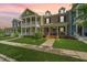 Townhomes with manicured lawns and colorful plants at 3466 Yarmouth Dr, Mount Pleasant, SC 29466