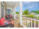 Inviting front porch with cozy seating, perfect for relaxing and enjoying the neighborhood views at 3466 Yarmouth Dr, Mount Pleasant, SC 29466