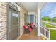 Inviting front porch with cozy seating, offering a relaxing outdoor space to enjoy the neighborhood at 3466 Yarmouth Dr, Mount Pleasant, SC 29466