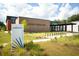 Exterior view of Wando Mount Pleasant Library featuring modern architecture and inviting landscaping at 3466 Yarmouth Dr, Mount Pleasant, SC 29466