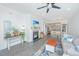 Bright living room featuring a fireplace and open view of the dining area and kitchen at 3466 Yarmouth Dr, Mount Pleasant, SC 29466