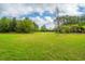 Green open space with trees in the background at 3466 Yarmouth Dr, Mount Pleasant, SC 29466