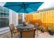 Back patio with paver flooring and a table and chairs under a blue umbrella at 3466 Yarmouth Dr, Mount Pleasant, SC 29466