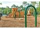 Community playground with a ship-themed play structure, swings, and slides, perfect for children at 3466 Yarmouth Dr, Mount Pleasant, SC 29466