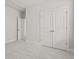 Bedroom featuring double doors, carpet, and neutral-colored walls at 347 Wappoo Trace Ln, Summerville, SC 29486